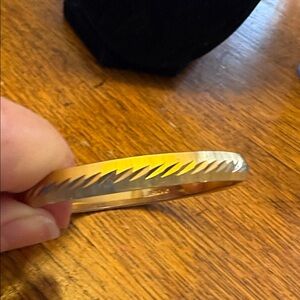 Brushed gold etched Monet bangle